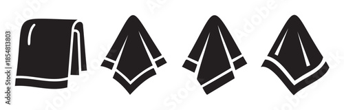 Four black silhouette towel icons set with various folds and drapes representing hygiene, cleanliness, and domestic use in a simple graphic design.