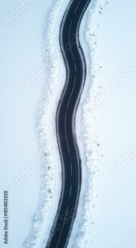 View of a road in the middle of a snowy field
