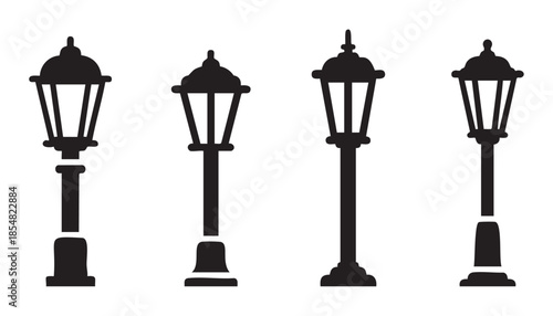 Four different vintage street lamp silhouettes stand tall, showcasing classic design elements suitable for various decorative and illustrative purposes.