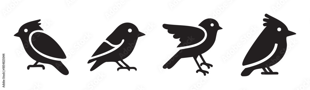 Fototapeta premium Four black bird icons with various poses and styles showcasing a collection of simple avian designs suitable for graphic elements and logos.