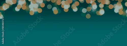 Golden bokeh lights creating a festive, vibrant effect with twinkling spots and soft glow. Circular