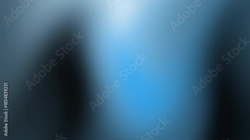 Smooth abstract blue gradient wallpaper featuring a dark stage backdrop with soft light glow and a wave texture design