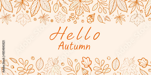 Autumn leaves and a handwritten hello autumn greeting on a beige background