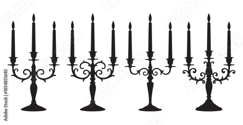 Set of four elegant candelabras with multiple candles vector silhouette collection isolated on white