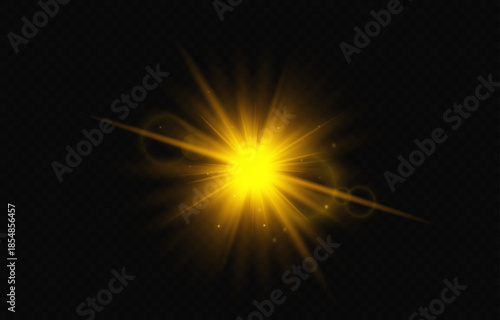 Bright golden flash of light on dark background - radiance, sunbeam, shining light effect, glitter, energy explosion, glow, abstract glow, illumination, background for design and photomontage