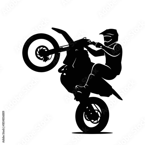silhouette of a man riding a motorcycle