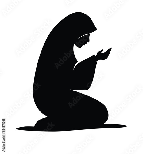Silhouette of a Muslim Woman in Prayer, performing "Dua" (supplication) while kneeling