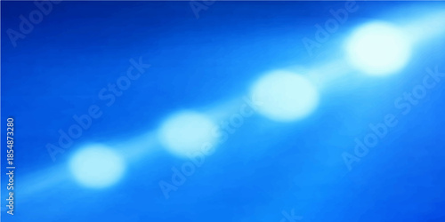 Shiny blue bokeh abstract background featuring a bright winter design with blurred circles of glowing light and glittery holiday xmas patterns on a defocused vector backdrop