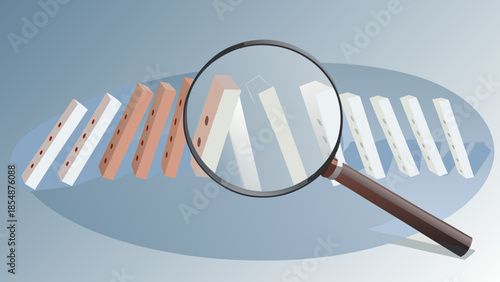 Magnifying glass examines falling dominoes in a line with brown and white pieces on a blue