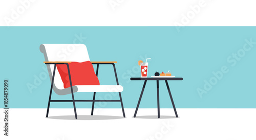 A modern outdoor lounge chair with a red pillow is placed next to a small table with a cocktail and dessert.