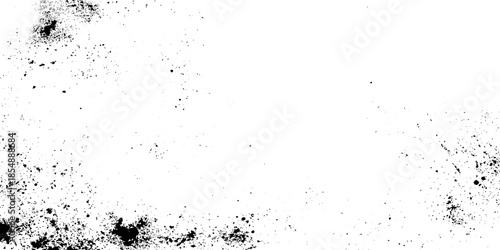 Abstract black and white texture featuring scattered dark specks and blotches on a clean bright background