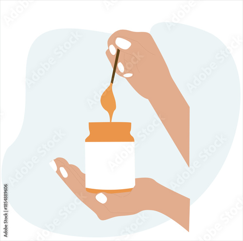 peanut butter. hand holding peanut butter
