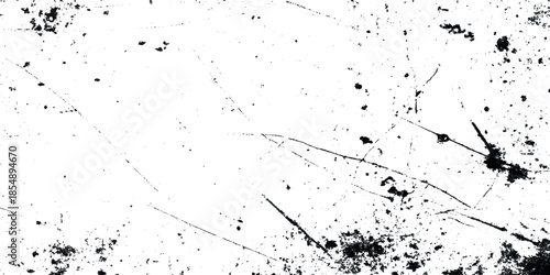 A stark grepsny black and white abstract image featuring fractured lines and dark smudges on a bright background