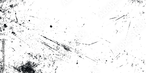 A textured abstract background featuring scratches smudges and dark imperfections on a predominantly white surface