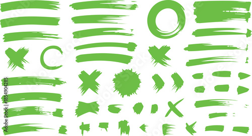 Assortment of green hand drawn brush strokes including X marks, curved shapes, and various lines