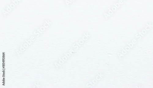 Close-up of subtly textured white paper surface, showing fibrous detail,  cardstock,  background