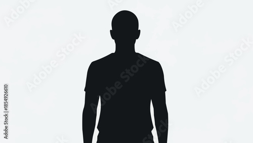 Silhouette of a man standing against a white background.