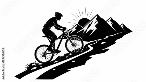 Silhouette of a mountain biker riding on a trail with mountains and sun in the background.