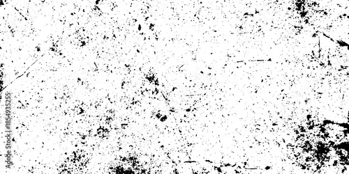An intricate black and white grunge background demonstrating a worn, speckle, and scratch overlay effect.