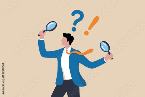 Businessman holding multiple magnifying glasses