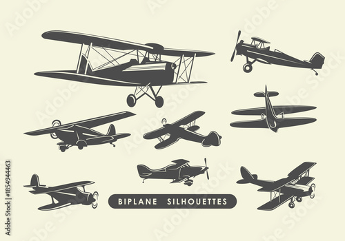 Biplane silhouettes set, vintage aircraft icons, black and white