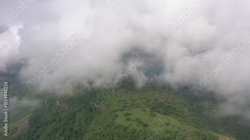 Foggy Green Mountains Covered in Low Clouds