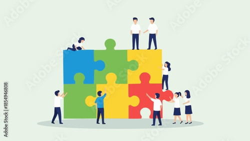 Teamwork assembling a large colorful puzzle together on a light background.