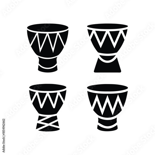 Four black and white illustrations of traditional african djembe drums with unique designs