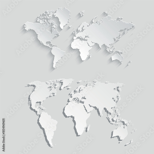 A world map cut out of gray paper. A set of political maps of the world on a gray