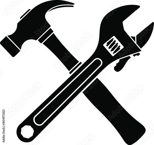 Black silhouette of a crossed hammer and adjustable wrench icon representing repair and construction
