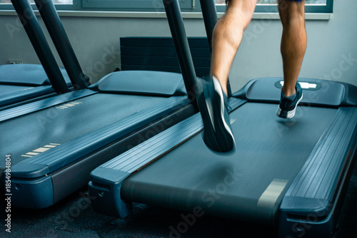 Close up of legs running on treadmill