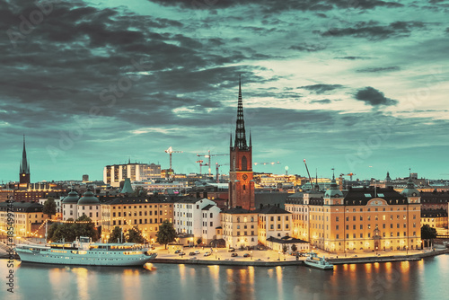 Stockholm, Sweden. Scenic View Of Stockholm Skyline At Summer Evening. Famous Popular Destination Scenic Place In Dusk Lights. Riddarholm