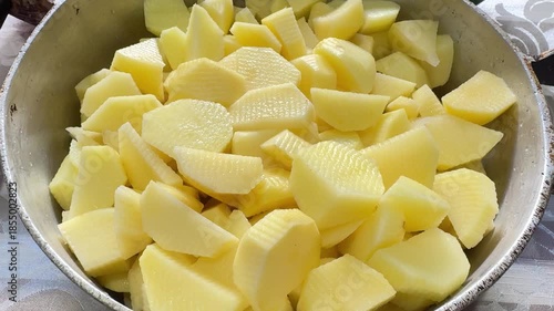 A pot full of sliced ​​potatoes for the mayonnaise