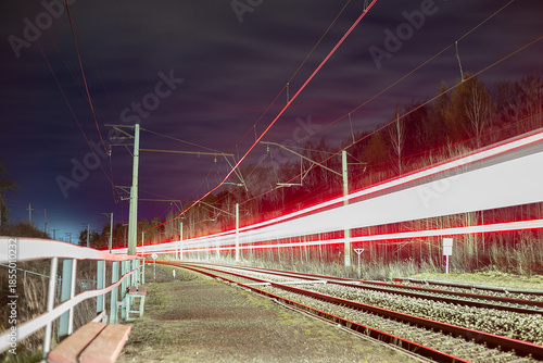 A railroad on a November evening. Long exposure photography. Light tunnel effect.