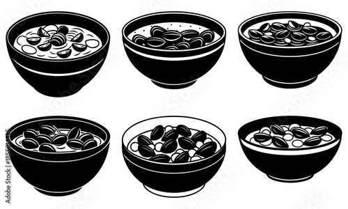 Six black bowls filled with nuts and seeds on white background 1