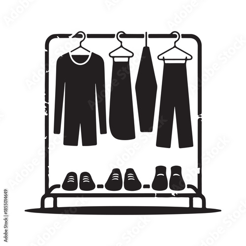 A simple clothing rack displaying shirts pants and shoes in black and white