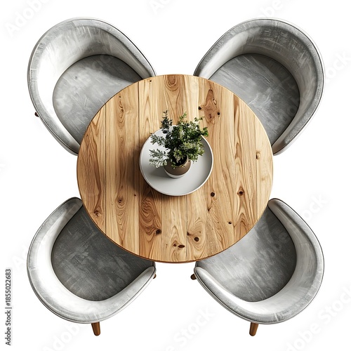 Overhead shot of a round wood table surrounded by four grey chairs, with a potted plant in the center