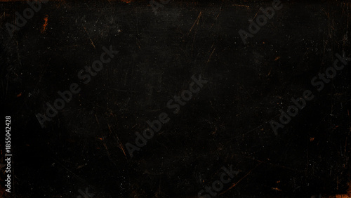 scratched dark surface with scratches and marks