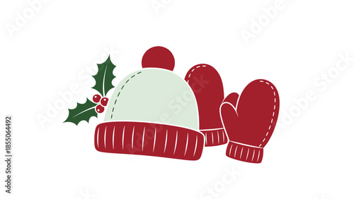 Winter hat and mittens with holly. Christmas winter clothing and decoration.