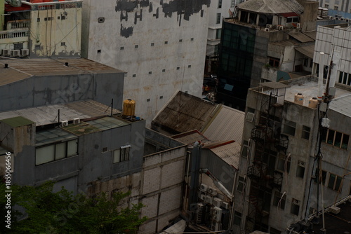 Urban landscape with old buildings and rooftops in a densely populated city