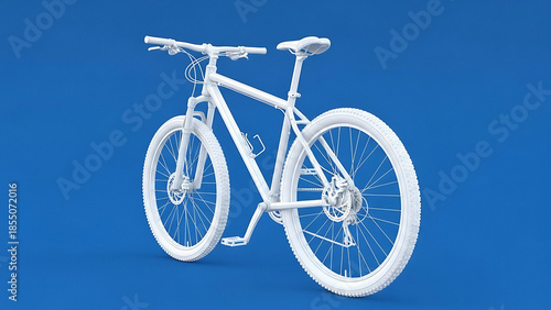 White mountain bike with thick tires and front suspension against blue background bicycle