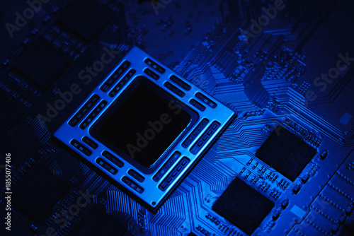 Foto Close-up of a modern gaming console system board with processor and memory chips, illuminated in blue light, showing integrated circuits and electronic architecture as a technology background