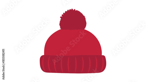A red knitted winter hat with a pom-pom sits on a white background.