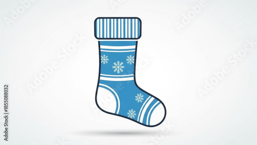 Blue christmas stocking with white snowflakes and stripes on cuff and toe, hanging alone on plain background