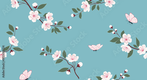 Charming seamless pattern of pink cherry blossom branches and butterflies floating on a light blue background for spring themed fabrics.