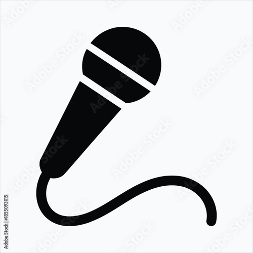 A classic black microphone with a connected audio cable rests on a clean white background ready for sound
