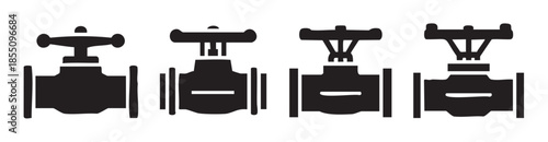 Industrial pipe valves in a row showcasing various types of control mechanisms for fluid flow regulation in plumbing and engineering systems.