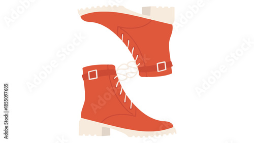 A pair of orange ankle boots with white laces and buckles.