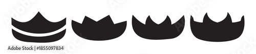 Abstract shapes set of four black crown-like elements with diverse spiky and wavy tops, perfect for modern graphic design projects.