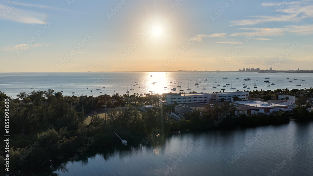 Fototapeta premium Sunset Skyline At Miami In Florida United States. Sunset Beach Skyline. Downtown Landscape. Summer Travel. Sunset Skyline In Florida United States. Highrise Buildings.
